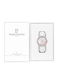 Reloj redondo con correa de cuero blanco y un patrón floral en la esfera. Presentado en una caja blanca con el logo de Pierre Lannier.