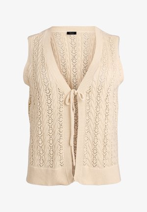 Kreemika värvi kootud varrukateta vest, millel on palmiku- ja pitsimustrid, ees avatud ning seotud väikese paelaga.