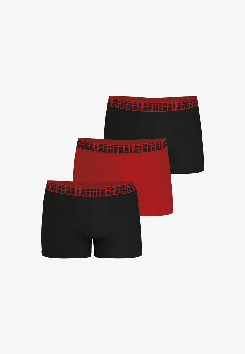 Trois pantalons de boxeur : deux noirs et un rouge, chacun avec une ceinture noire ornée du logo "ATHENA" en rouge. Texture de tissu lisse.