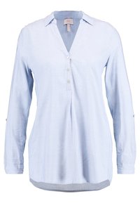 Hellblaues Langarmhemd aus weichem Stoff mit V-Ausschnitt, Knopfleiste und lockerem Schnitt mit geschwungenem Saum.