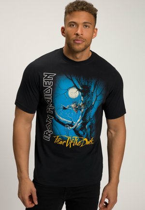 Černé bavlněné tričko s modrošedou grafikou kosterní postavy v roce, se tekstem "Iron Maiden" a "Fear of the Dark".