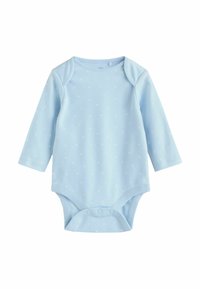 Ljusblå långärmad body med vita prickar, rund halsringning och tryckknappar i nederkant. Tillverkad av mjukt bomullstyg.