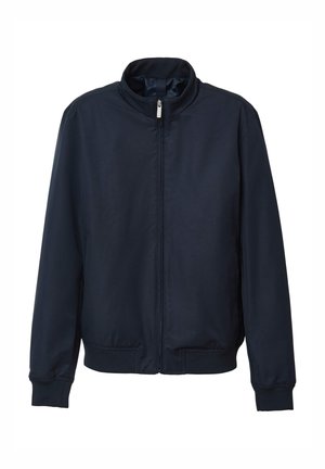 Giacca bomber blu navy in materiale leggero; presenta un colletto alto, zip frontale completa, polsini e vita elasticizzati, con una texture liscia.