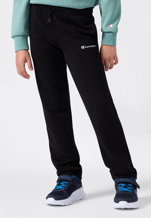 Svarta sweatpants i en blandning av bomull, med elastisk midja, sidofickor och en liten vit "Champion"-logotyp på låret.