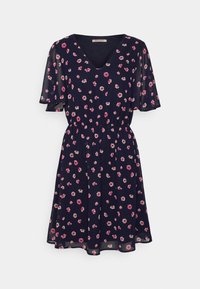 Robe courte bleu marine avec imprimé floral rose et blanc, décolleté en V, manches courtes volantées et taille froncée.