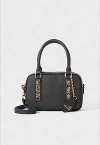 Black rectangular handbag with top handles, detachable shoulder strap, gold chain tag, and "Love Moschino" logo accents on front straps.