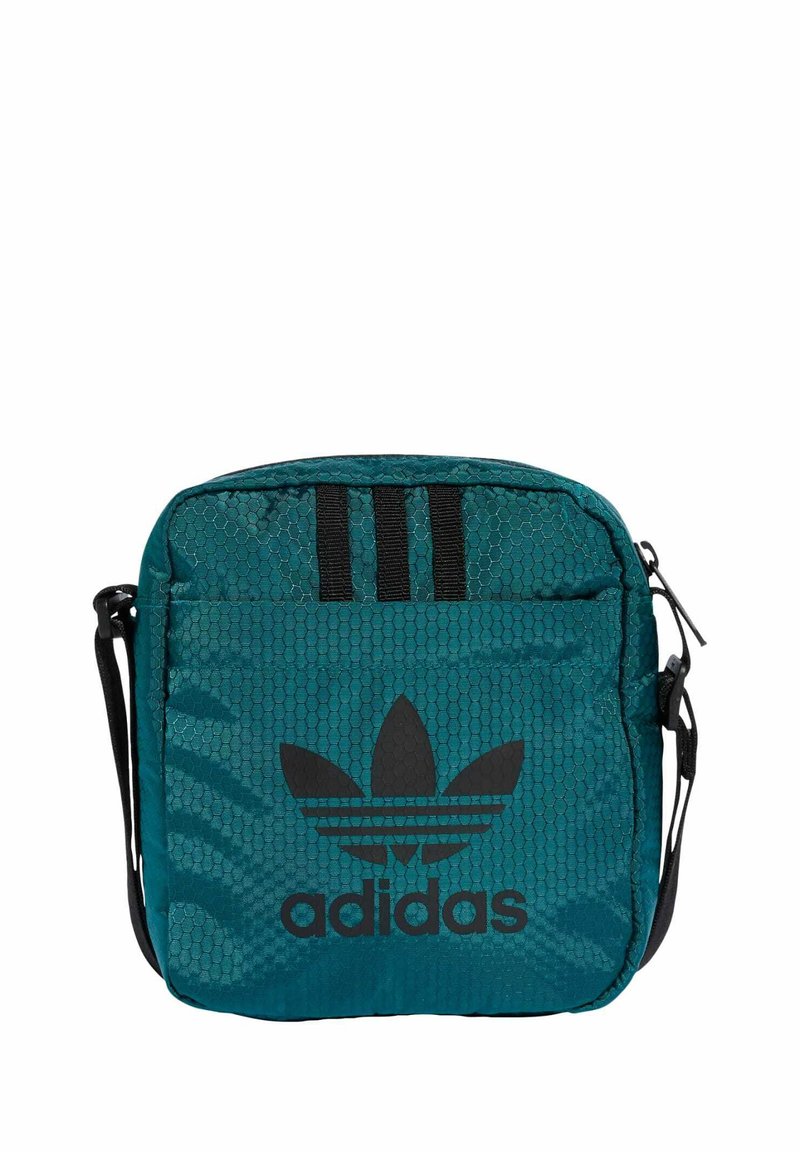 Borsa a tracolla rettangolare turchese realizzata in tessuto con trama esagonale, con logo Adidas nero e tre strisce nere sulla parte superiore.