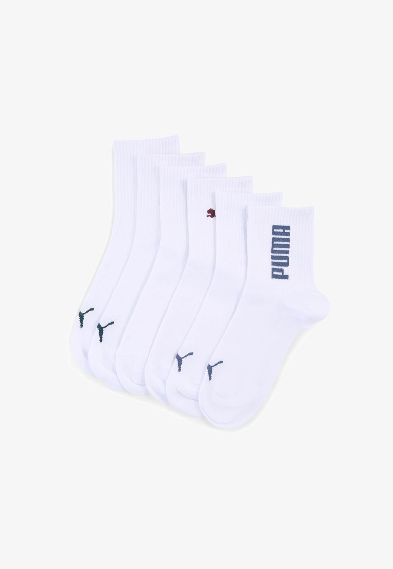 White crew socks in a pack of five. Each features a ribbed texture with varied small logos in dark green, navy, and burgundy.