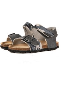 Sandales à motif camouflage avec des sangles réglables, couleurs grises et noires, semelle en liège, semelle texturée et fermeture à boucle pour un maintien sécurisé.