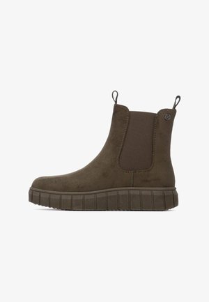 Botas de tobillo de ante marrón con paneles laterales elásticos, tiradores y suela gruesa estriada. Textura suave con elementos de diseño minimalistas.