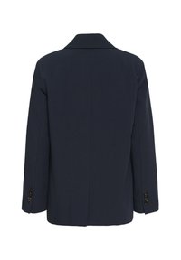 Blazer azul marino con cuello estructurado, que cuenta con una sola abertura en la parte trasera y puños con botones. Tejido liso, diseño entallado.