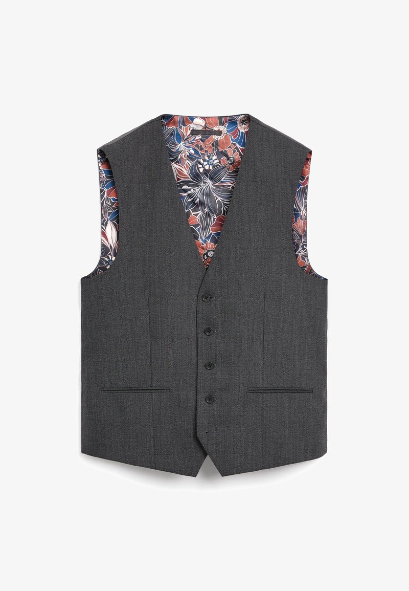 Gilet gris boutonné avec deux poches, doté d'une doublure à motif floral coloré dans des tons de bleu, de rouge et de blanc.