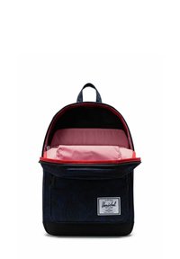 Sac à dos bleu marine avec motif cachemire, intérieur et bordure rayés rouge et blanc, base noire, poche avant zippée et poignée supérieure.