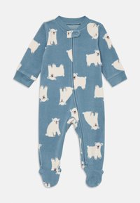 Sininen fleece-jumppari, jossa on valkoinen jääkarhu-kuvio, pitkät hihansuut, nepparit ja resorit nilkoissa. Pehmeä rakenne tarjoaa lämpöä.