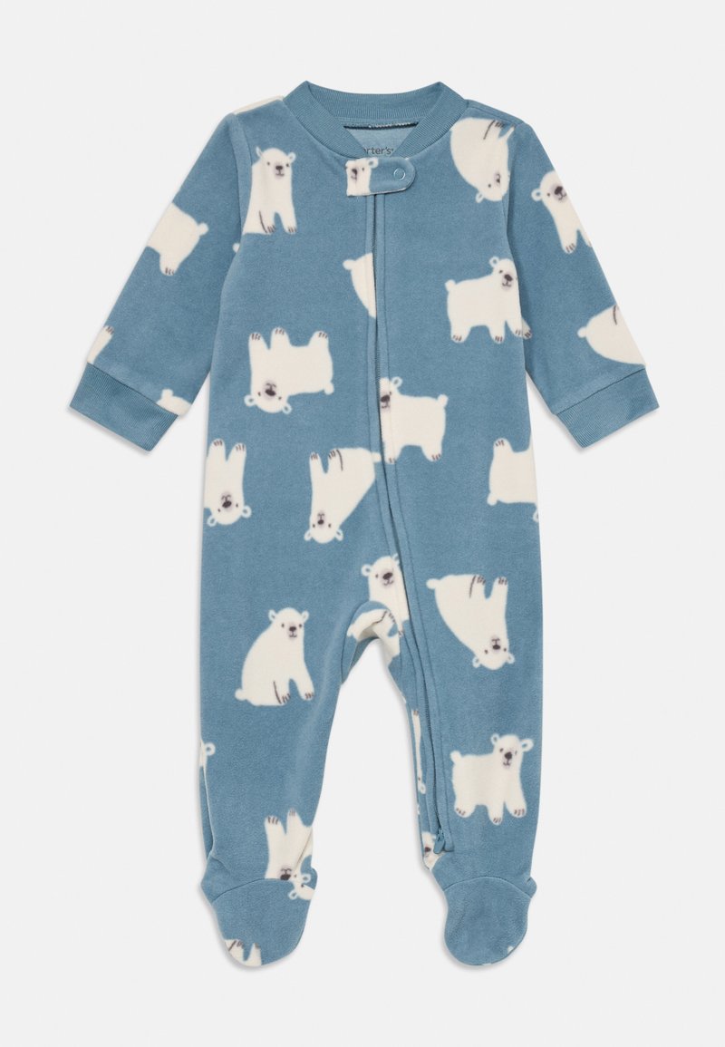 Sininen fleece-jumppari, jossa on valkoinen jääkarhu-kuvio, pitkät hihansuut, nepparit ja resorit nilkoissa. Pehmeä rakenne tarjoaa lämpöä.