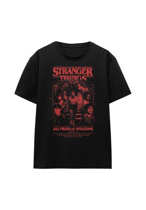 Black cotton t-shirt featuring a distressed red graphic print of characters from "Stranger Things" with the text "All Friends Welcome."