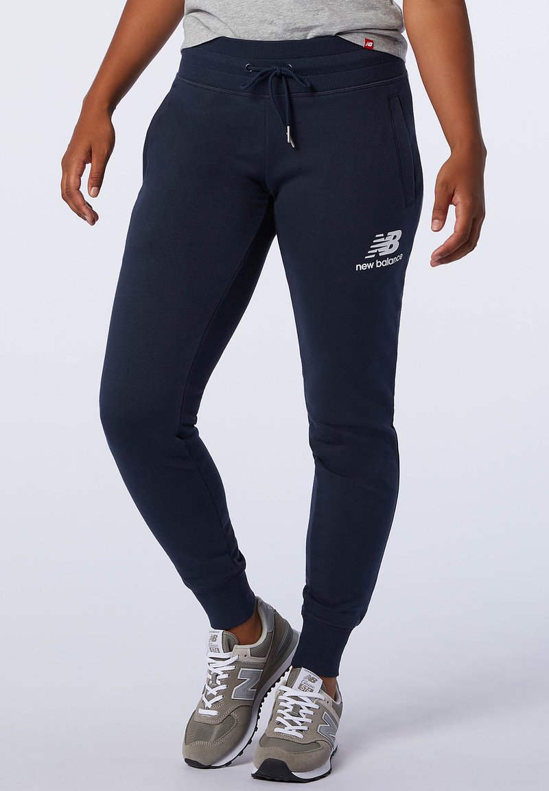 New Balance Tracksuit bottoms eclipse/0/dark blue Zalando.co.uk