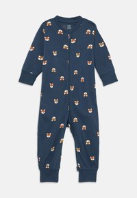 Combinaison en bleu marine pour enfants, fabriquée en tissu doux, ornée d'un motif répétitif de visages de renards en cartoon, avec fermeture éclair et manches à revers.