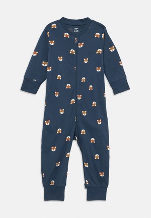 Navy blue lasten haalari, joka on valmistettu pehmeästä kankaasta ja jossa on toistuva kuvio piirretyistä kettuista, vetoketjukiinnityksellä ja hihansuiden käänteillä.