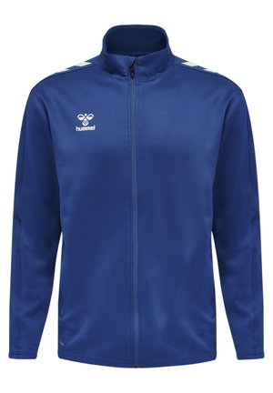 Blue athletic jacket made of smooth fabric, features a full zipper, stand-up collar, two side pockets, and white logo and stripes on shoulders.