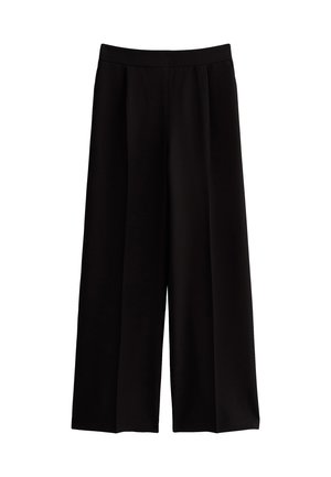 Pantalons large noirs en tissu doux, dotés d'une taille élastique lisse et sans fermetures ni motifs visibles.