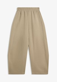 Beige wijde broek van zacht materiaal, met een elastische tailleband en zijnaad die een relaxte silhouet creëren.