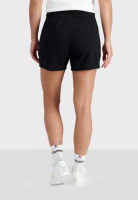 le coq sportif ESSENTIELS - Teplákové kalhoty - black