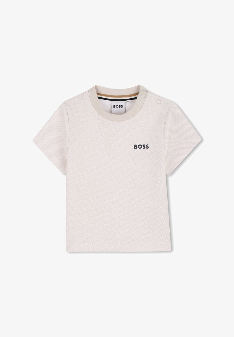 Petit T-shirt blanc texturé pour tout-petit avec manches courtes, col rond, boutons pression à l'épaule et logo "BOSS" sur la poitrine.