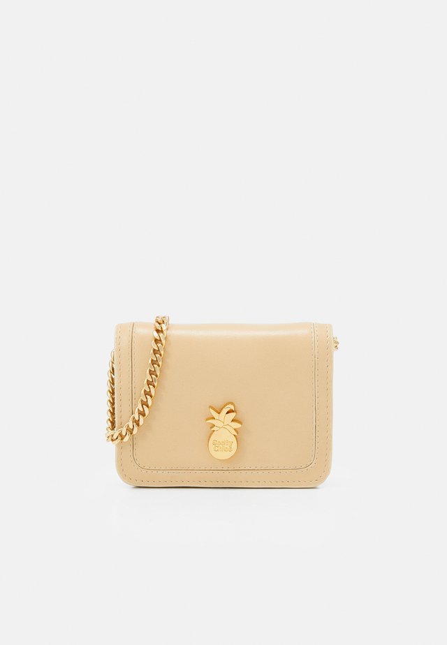 Bandolera - seed brown