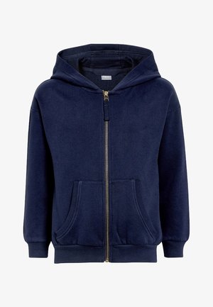 Temno modra zip-up kapuca, izdelana iz mehkega materiala, z sprednjim zadrgo, dvema stranskima žepoma in kapuco s vrvico. Ribljenicni manšeti in rob.
