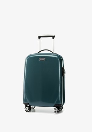 Valise rigide en teal, avec un extérieur à motifs, une poignée rétractable et quatre roues pivotantes pour une mobilité aisée.