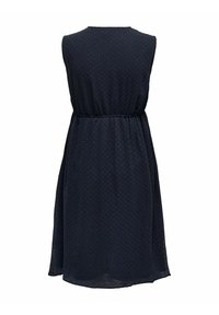 Robe sans manches bleu marine foncé avec texture à pois, taille cintrée et jupe fluide au genou, vue de dos sur fond blanc.