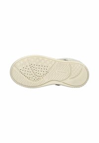 Suela de zapato con un caucho texturizado de color crema que presenta un patrón de surcos y perforaciones para mejorar el agarre y la flexibilidad.