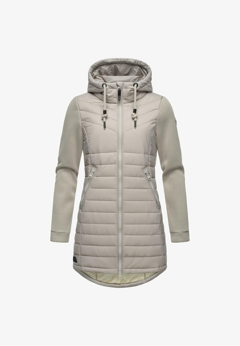 Polstret beige frakke med hætte, lynlåslukning foran og to sidelommer. Har bløde stofærmer og en længere bagkant. Struktureret design.