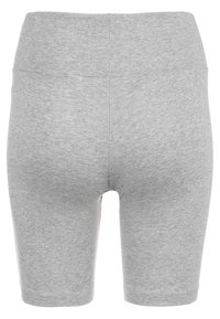 Grey cotton blend bike shorts with a fitted design, reaching mid-thigh length, featuring a stretchy waistband and smooth texture.