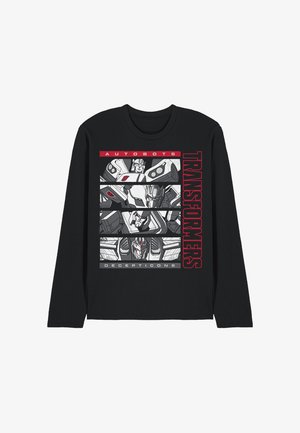 Schwarzes Longsleeve-T-Shirt mit einem Grafikdruck von Transformers-Charakteren in Grautönen und rotem Text mit den Aufschriften "Autobots" und "Decepticons."