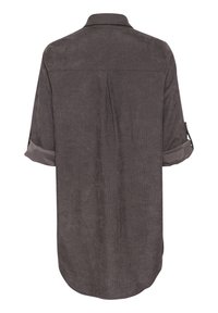 Langærmet skjorte i mørkegråt stof med en tekstureret finish. Har krave, rygplissering og opkrogede ærmer med justerbar længde.