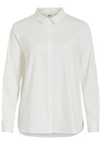 Blusa blanca de manga larga hecha de algodón, con un frente abotonado, cuello puntiagudo y corte recto; presenta un dobladillo redondeado y puños abotonados.