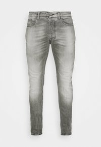 Šedé džíny slim fit s vyblednutím a mírným poškozením, zapínání na přední knoflík a pět kapsovým stylem.