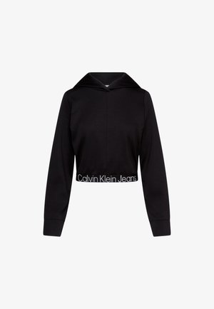 Zwarte cropped hoodie van zacht materiaal. Heeft een capuchon, lange mouwen en een gebrandmerkte elastieken tailleband met "Calvin Klein Jeans" in het wit.
