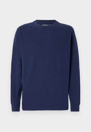 Long-sleeve navy blue t-shirt made of cotton, featuring a crew neckline, straight hem, and ribbed cuffs. Simple, solid design.