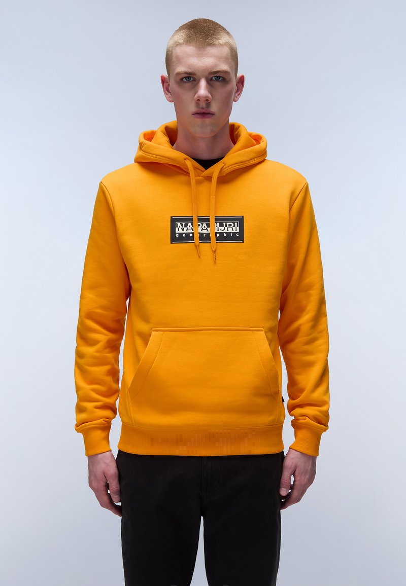 Oranje katoenen hoodie met een voorkant(kangaroo)zak, ribgebreide mouwen en een gedrukt rechthoekig logo. Ontworpen met een capuchon met trekkoord.