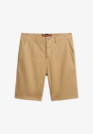 Tan katoenen shorts met een vlakke voorkant, twee zijzakken en een achterzak. Beschikt over een knoopsluiting en een gebrandmerkte tailleband.