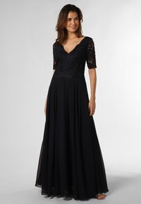 Marine lange jurk met een bloeiende kant lijfje en korte mouwen. Vloeiende rok, V-hals en doorzichtige stoftextuur verhogen de elegantie.