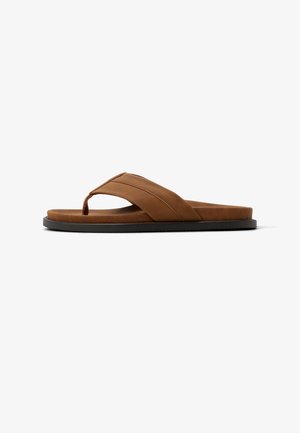 Brown flip-flop sandal with a textured upper, perforated design, and a rubber sole. Features a V-shaped thong strap for secure fit.