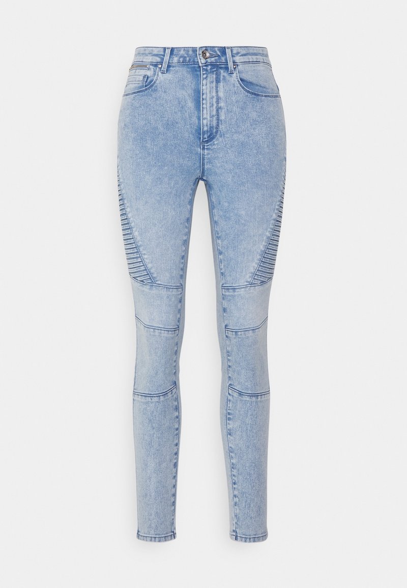 Light blue high-waist skinny jeans with ribbed detailing on thighs and knee seams, front button, and zip closure.
