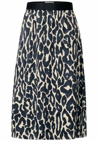 Leopardmönstrad kjol med ett brett, svart elastiskt midjeband. Har en krämfärgad bakgrund med mörkblå fläckar. Tillverkad av lättviktigt material.