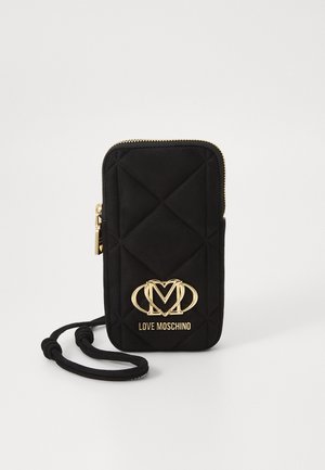 Black quilted phone case with gold hardware featuring the logo "LOVE MOSCHINO," secured with a zipper and an adjustable strap.