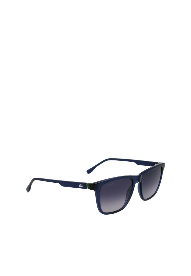 Sunglasses with a navy plastic frame, square lenses transitioning from dark to light gray, and a green accent on the temples.