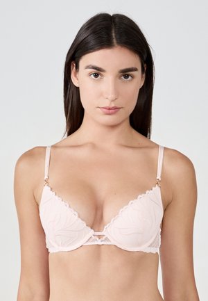 Jasnoróżowy stanik w kształcie trójkąta z koronkowymi detalami, regulowanymi ramiączkami i złotymi akcentami. Posiada falbanki na krawędziach oraz wycięcie pośrodku.